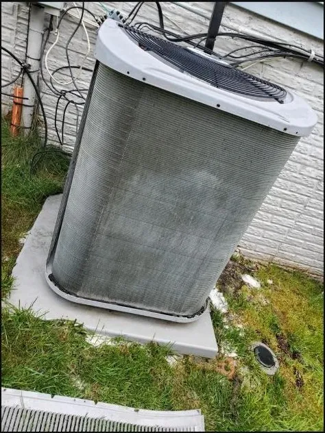 Outdoor AC unit — before cleaning