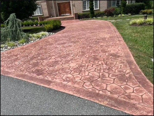 Red stamped concrete driveway