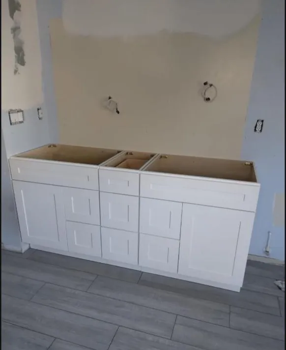 White shaker vanity cabinets — installation